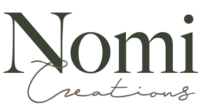 Nomi Creations logo
